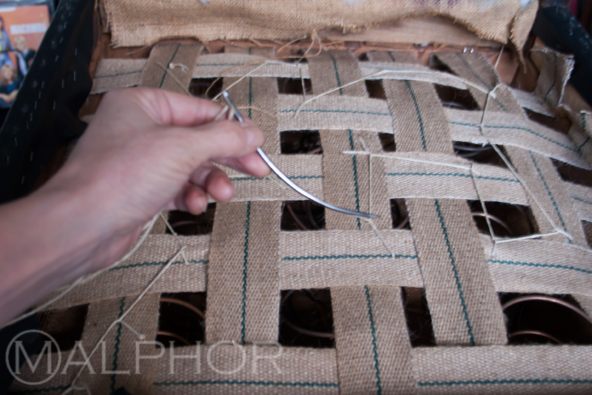 Lashing The Spings Onto New Webbing